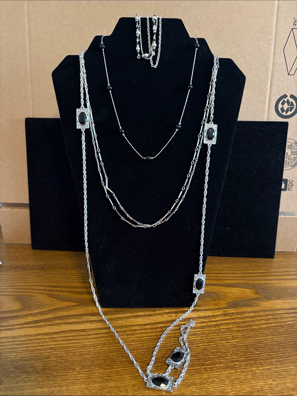Beautiful lot of 4 Silver-tone Jewelry, 3necklaces, and 1 bracelet.